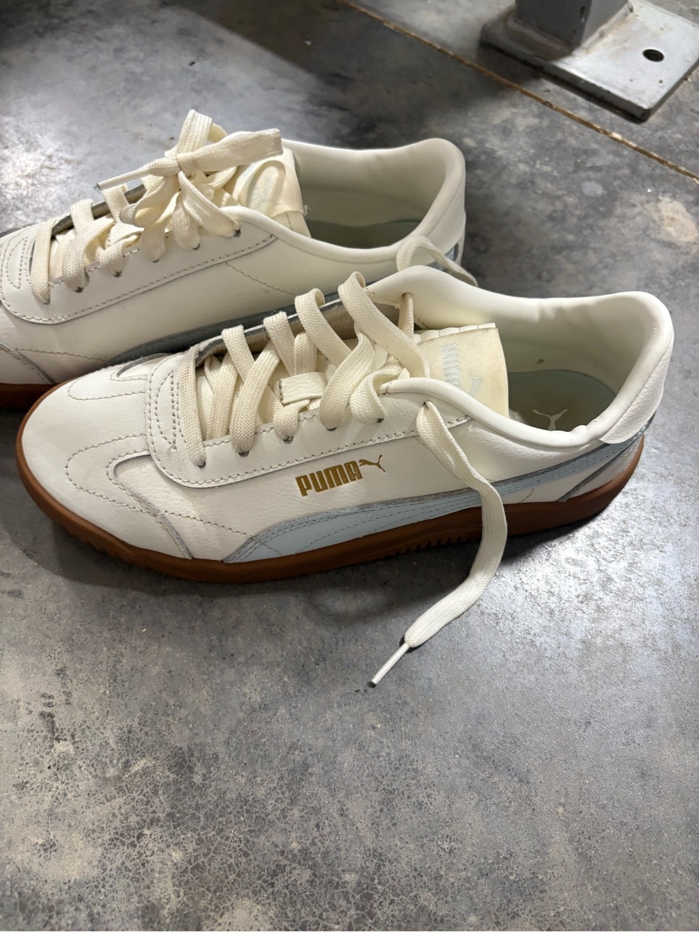 Puma Cream Leather Sneakers with Light Blue Accent and Gum Sole